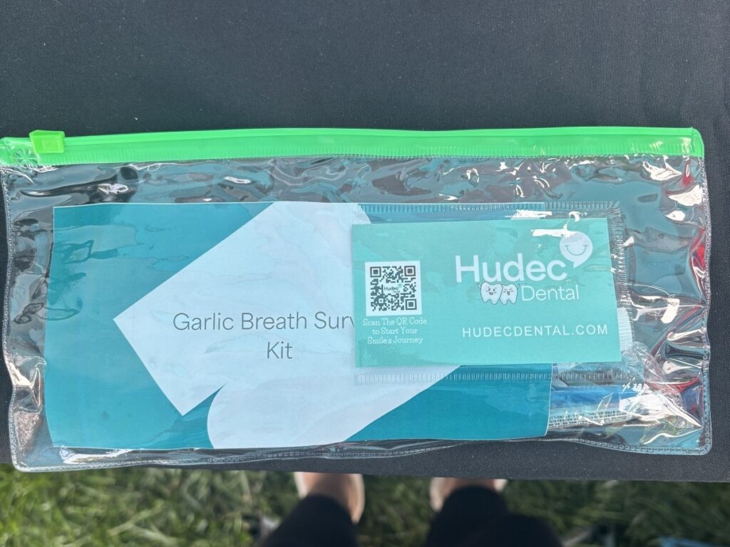 Close up of a Hudec Dental handout for the 2026 Cleveland Garlic Festival